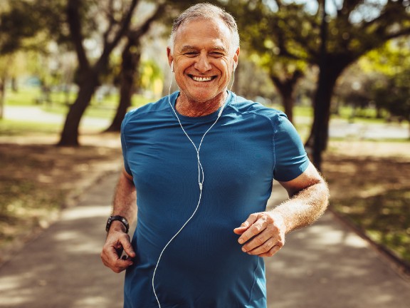 Man jogging with headphones in