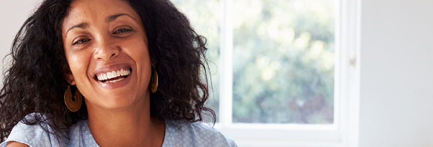  Woman improves her overall health and wellness by maintaining and paying attention to her thyroid..